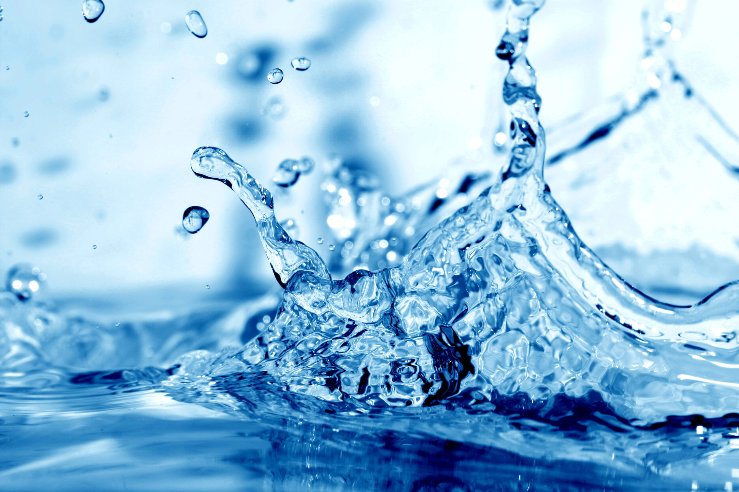 Close-up of clean water splash symbolizing purified and softened water